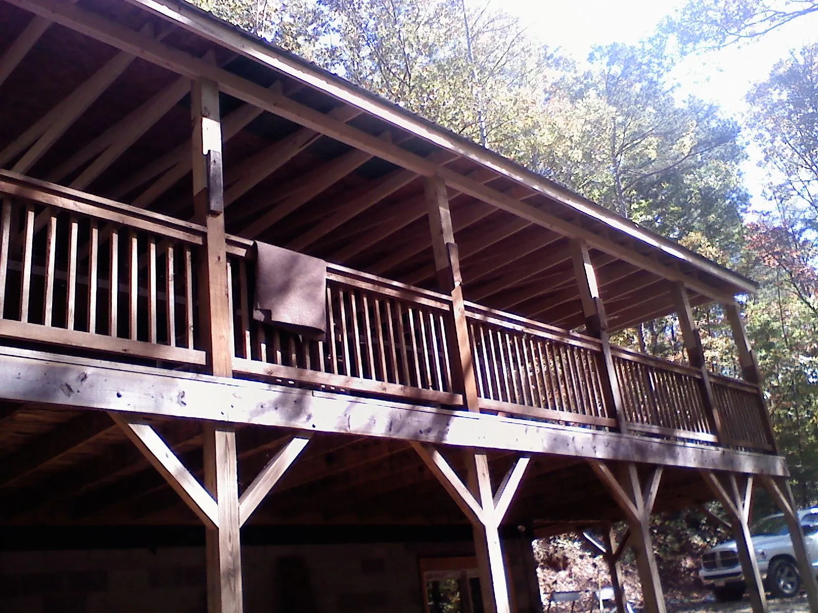 Timber framing under a new elevated porch and deck — Roof Leak Repair in Haverhill by Roofing Brothers